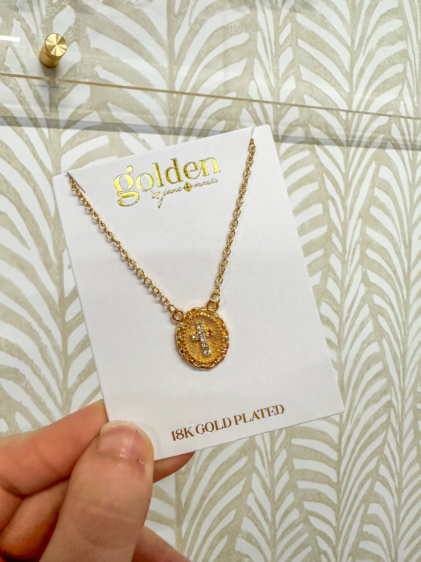 Golden Decorative Oval Mini Crystal Cross Necklace
